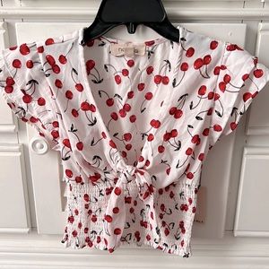 •CHERRY NO FRILLS TOP